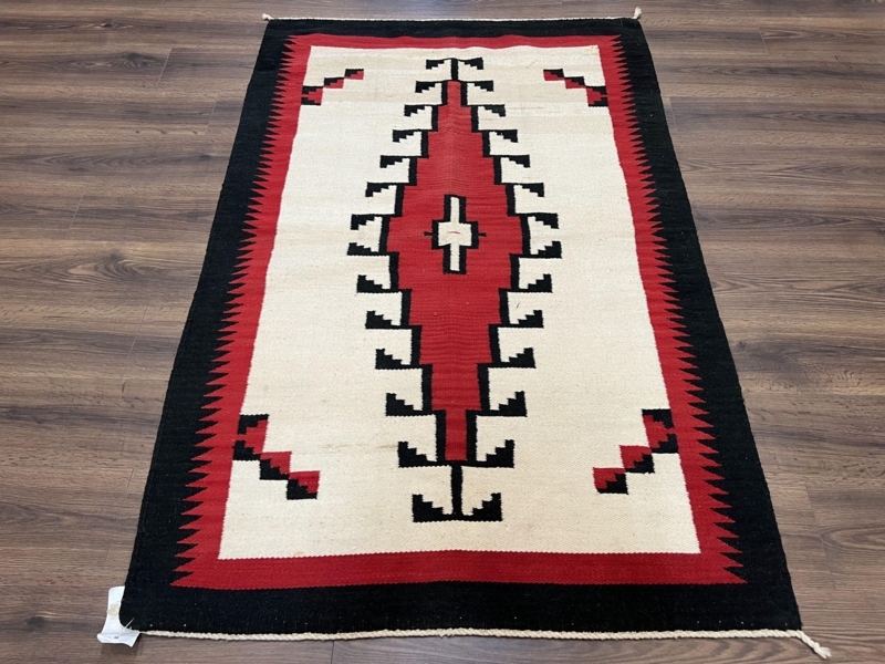 Area Rug with Brick Red Diamond Medallion and Sawtooth Border