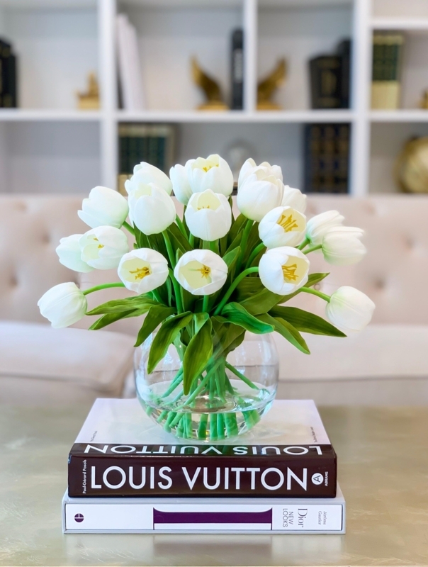 Artificial Flower Arrangement, Round Glass Bowl, Stacked Designer Books