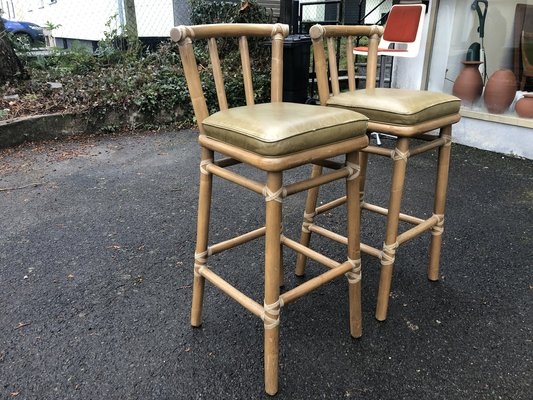 Bamboo Rattan Bar Stools featuring Rawhide Bindings and Olive Seats