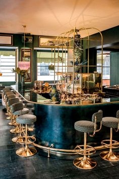 Bar Stools with Gold Trumpet Base and Geometric Patterned Upholstery