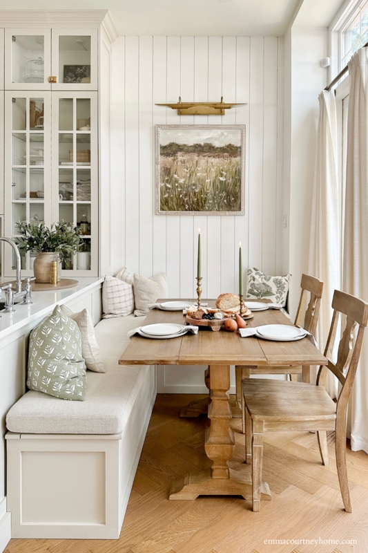 Built-In Banquette Storage Vertical Paneling Glass Front Cabinets