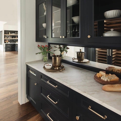 Cabinet Hardware Gold on Black with Mirrored Backsplash