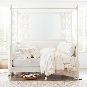 Canopy Daybed Cream Turned Legs Upholstered Back with Tasseled Bedding