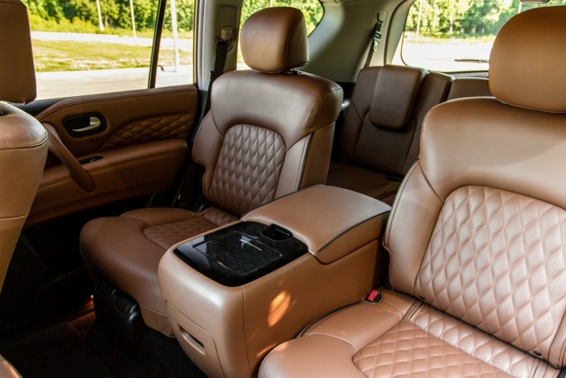 Captain Chairs: Cognac Brown Diamond Quilting with Oversized Console