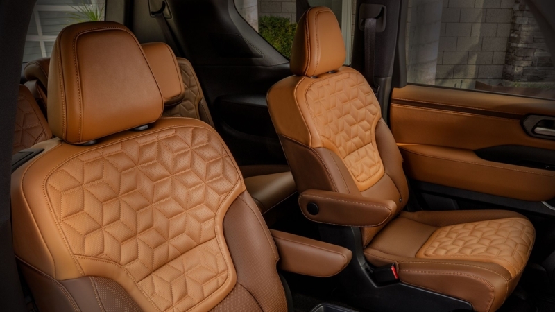 Captain's Chairs featuring Two-Tone Caramel Geometric Quilting Design