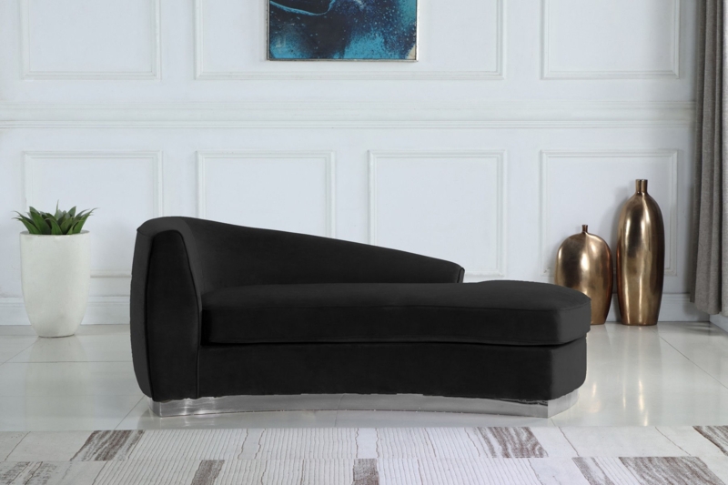 Chaise Lounge: Polished Metal Base, Sleek Velvet, Contemporary Glam.