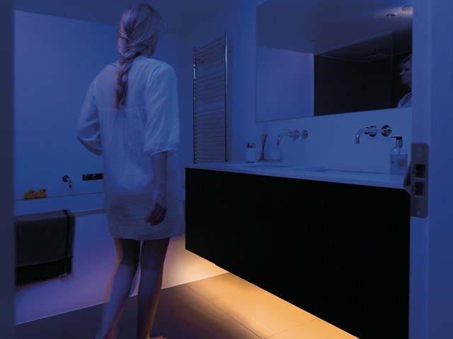 Contemporary Bathroom Lighting featuring Under-Cabinet Toe Kick Glow