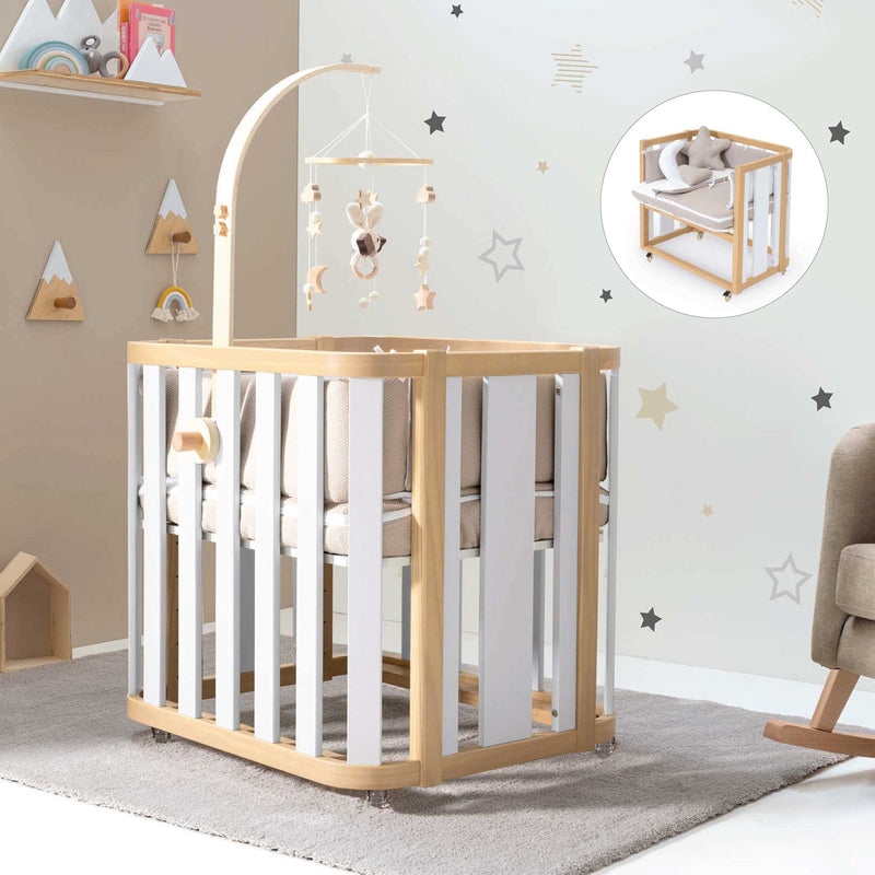 Convertible Crib in Wood and White with Integrated Mobile Arm