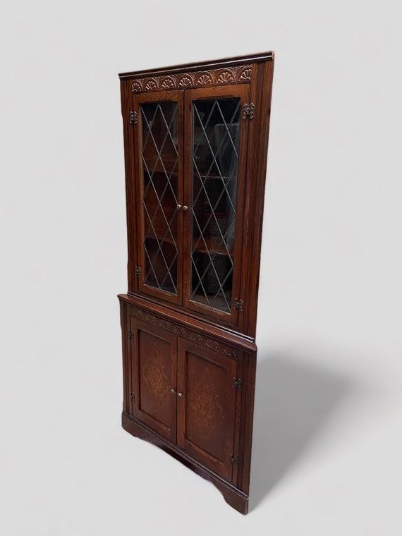 Corner Cabinet with Leaded Glass Doors and Carved Frieze