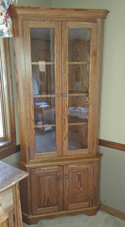 Corner Cupboard with Raised Panel Doors and Scalloped Apron