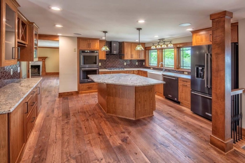 Craftsman Kitchen Cabinets with Stained Glass Lighting & Geometric Island