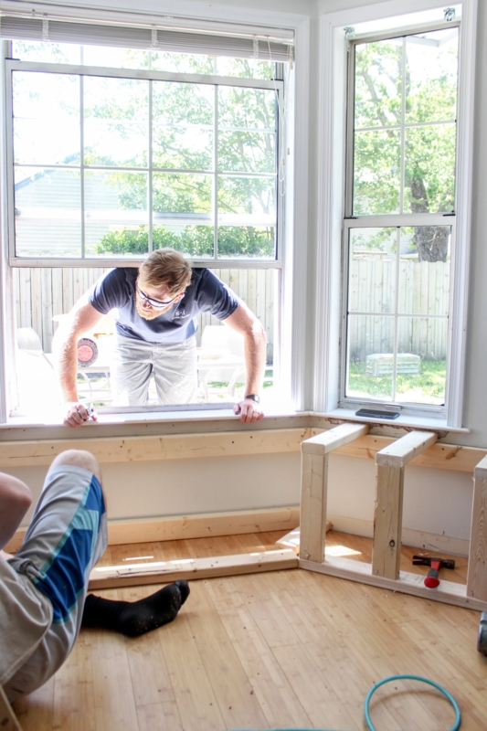 DIY Built-In Bench for Bay Window Nook with Natural Wood Framing