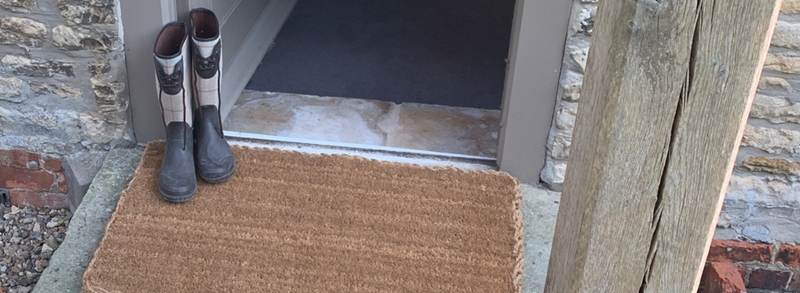 Doormat: Heavy Duty Scraper Surface with Ribbed Texture for Mudrooms