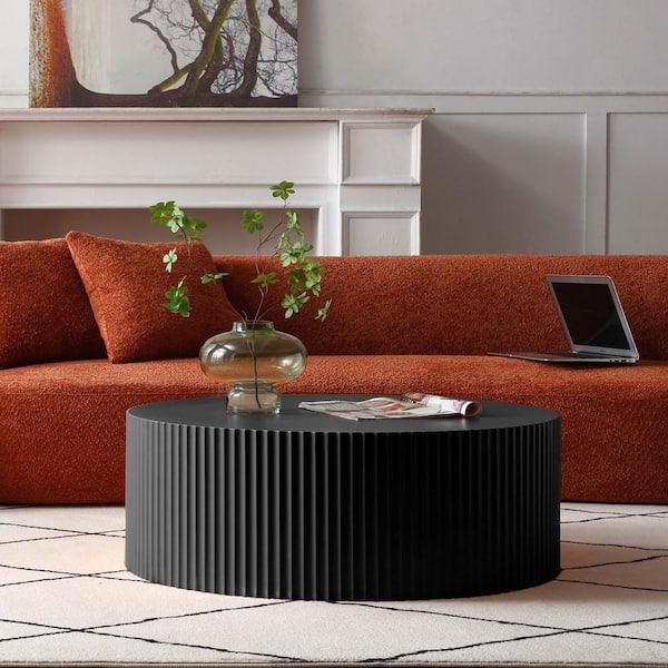 Drum Coffee Table with Fluted Relief Design and Contemporary Matte Black