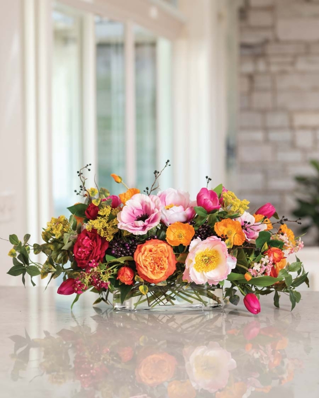 Flower Centerpiece with Multi Tonal Blooms in Clear Rectangular Vase