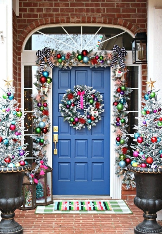 Front Door: Blue door, flocked greenery, buffalo check bows.