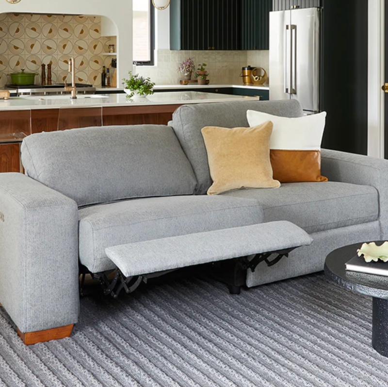 Heathered Gray Reclining Sofa with Retractable Footrest