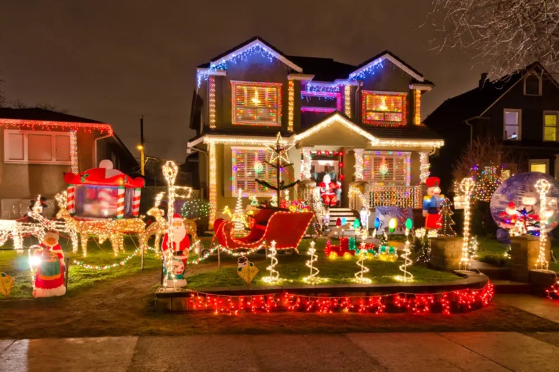 Holiday Outdoor Lighting: Window outlining, spiral trees, lawn inflatables.