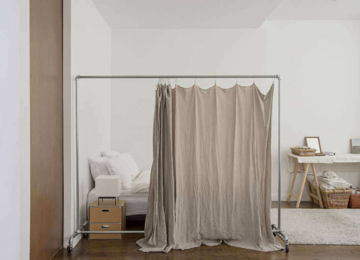 Industrial Pipe Room Divider Frame with Beige Fabric Curtain