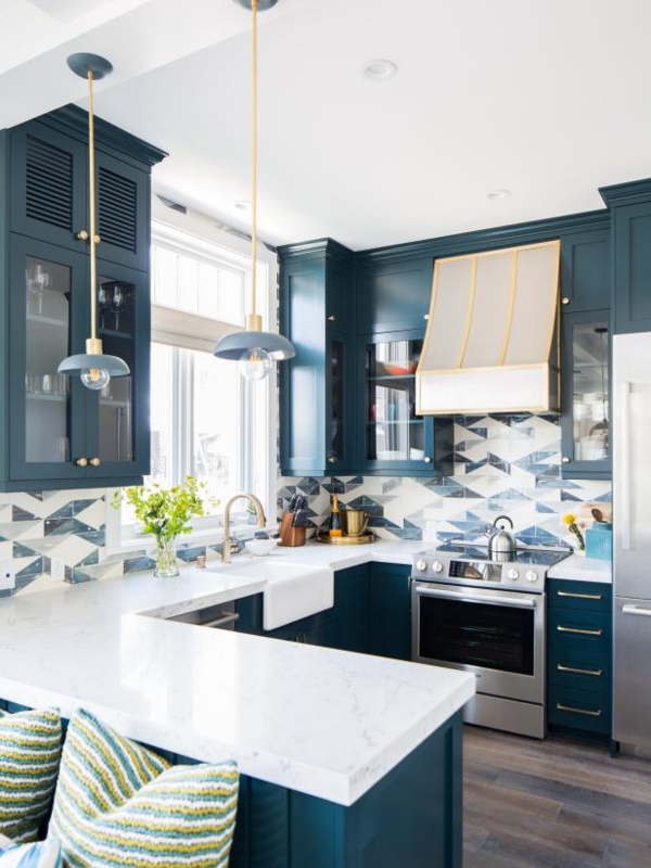 Kitchen Cabinetry Deep Teal Geometric Tile Backsplash Brass Accents