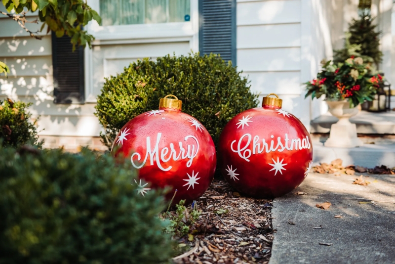 Lawn Ornament: Script lettering, starburst patterns, oversized scale.