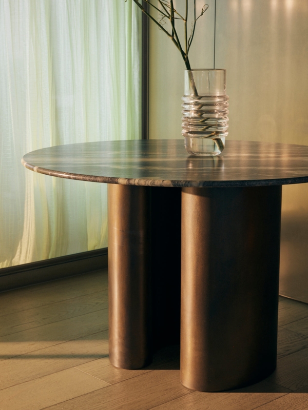 Linear Veined Stone Table with Thick Bronze Patina Pillar Base