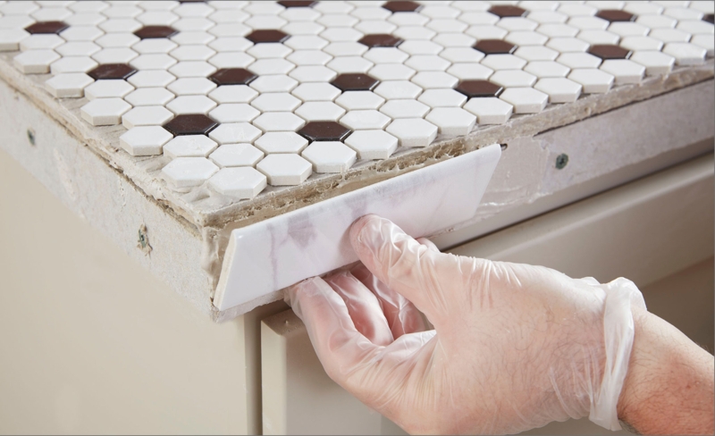 Marble Look Bullnose Tile Trim Finishing a Hexagon Mosaic Countertop Edge