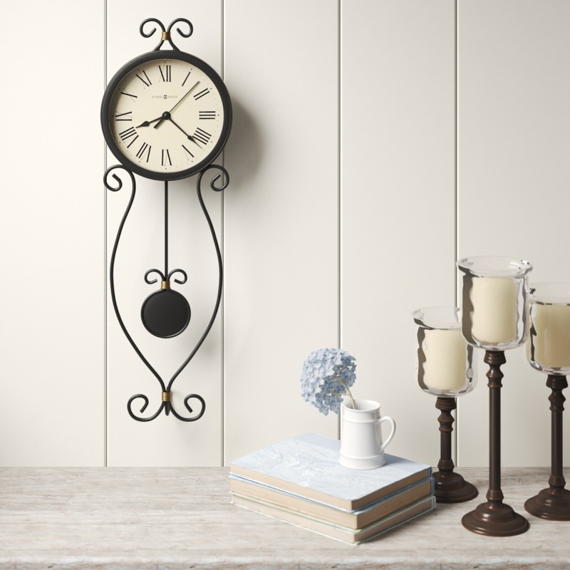 Matte Black Iron Wall Clock with Unique Hourglass Silhouette