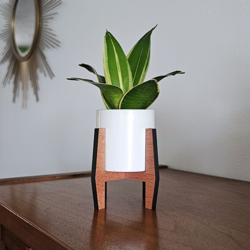 Mini MCM Plant Stand with Angled Sides and Two-Tone Wood Finish.