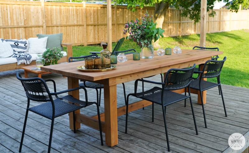 Modern Farmhouse Outdoor Dining Table with Black Woven Chairs