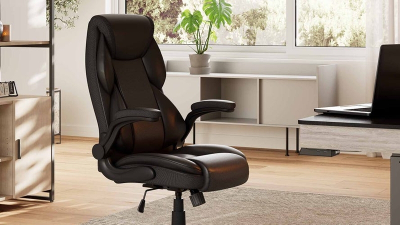 Office Chair Featuring Perforated Panels, Flip-Up Arms, and Lumbar Support