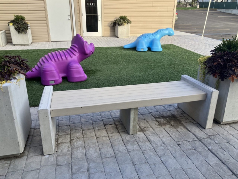 Outdoor Bench: Backless Composite Slat Bench with Concrete Center Support