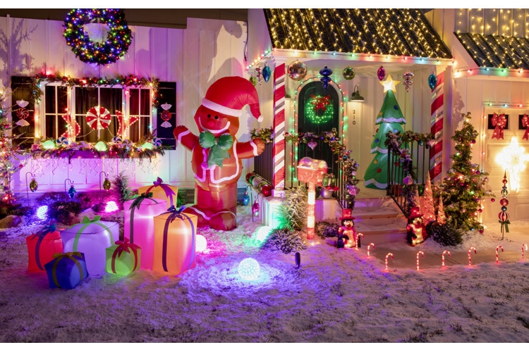 Outdoor Christmas Decor: Glowing gift boxes, inflatable gingerbread man.