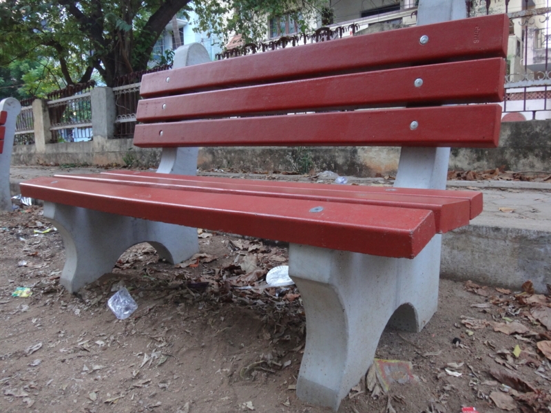 Park Bench: Terracotta Red Park Bench with Curved Concrete Base