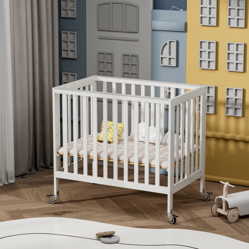 Portable Crib in Matte White with Slim Vertical Slats