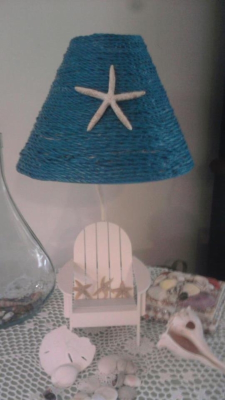 Purchased blue cord @ $1 store and glued on lamp shade with glue gun!  Purchased Adirondack chair lamp @ Joblot for $2.95! Total summer chair lamp  for side table: less then $5.00!