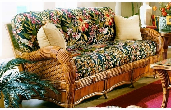 Rattan Sofa featuring Bent Frame and Botanical Print Cushions
