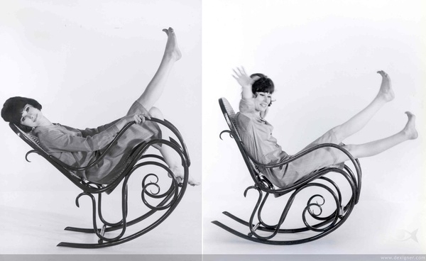 Rocking Chair: Glossy Dark Wood Scrolled Frame, Classic Cane Back Rocker