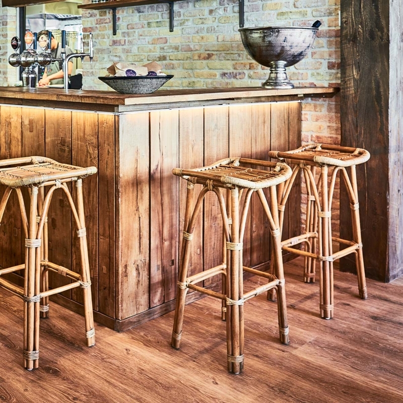 Rustic Rattan Bar Stools with Reinforced Leg Bindings and Woven Wicker