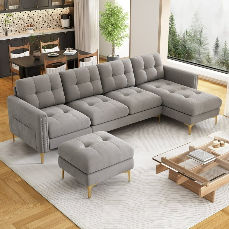 Sectional Sofa featuring Gold Tapered Legs and Tufted Cushions
