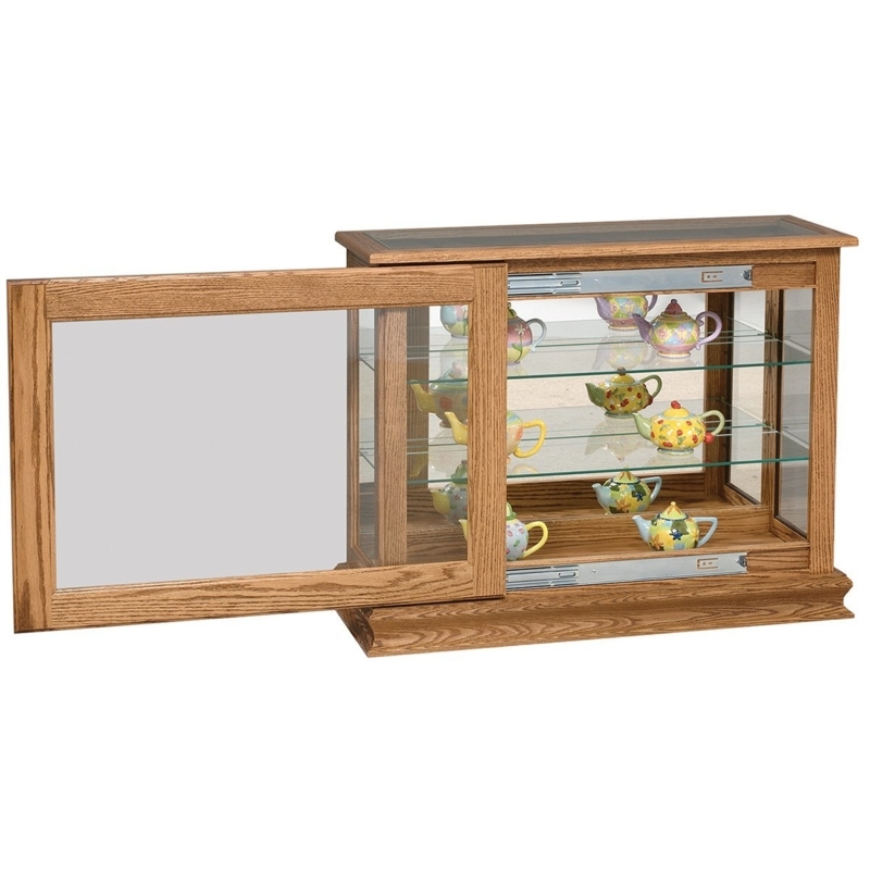 Sliding Door Curio Console in Honey Oak with Mirrored Back