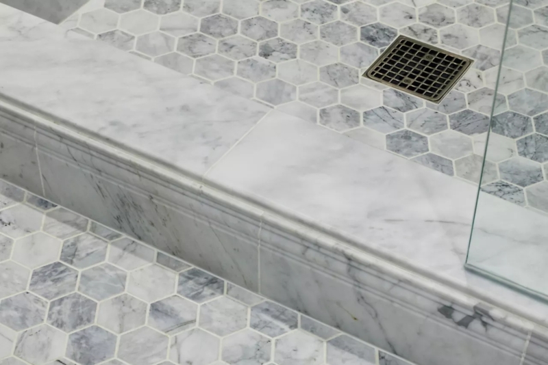 Solid Stone Shower Threshold with Marble Hexagon Mosaic Floor