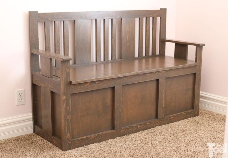Storage Bench: Mission style walnut brown, slatted backrest, recessed panels.