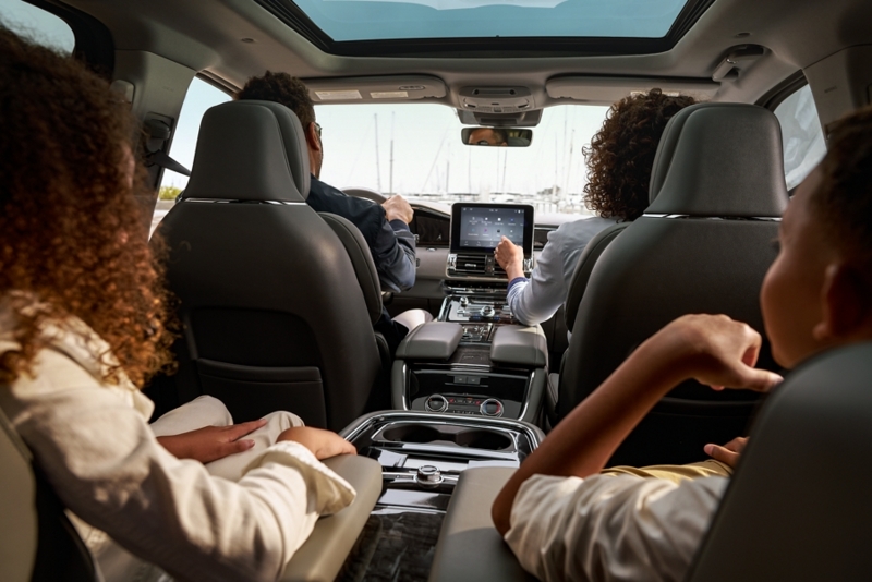 SUV Interior featuring Captain Chairs, Panoramic Sunroof and Rear Console