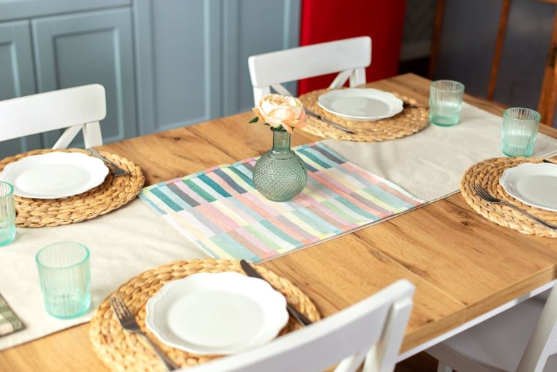 Table Runner Styling: Layered Pastel Stripes and Woven Placemats