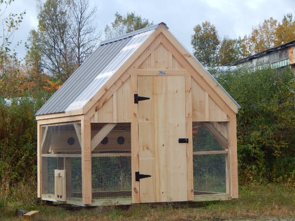 Timber Frame Chicken Coop with Steep Gable Roof and Corrugated Metal