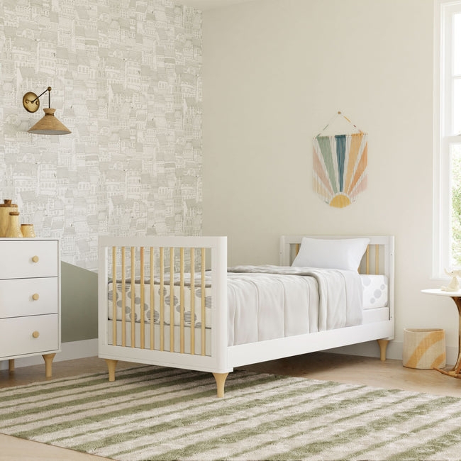 Toddler Bed with Natural Wood Spindles and Tapered Legs in White