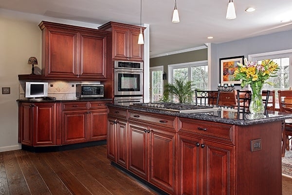 Traditional Wood Cabinetry with Blue Gray Kitchen Walls