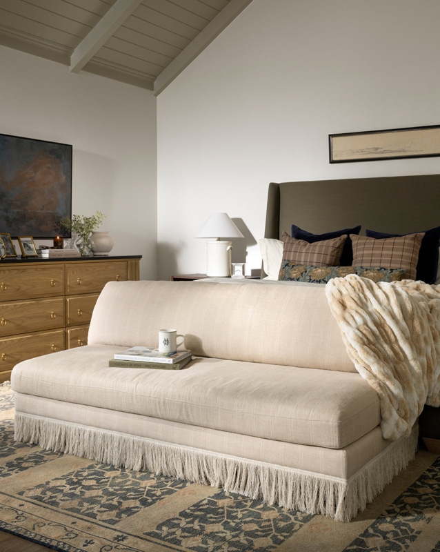 Upholstered Bench with Fringe Skirt and Low Backrest