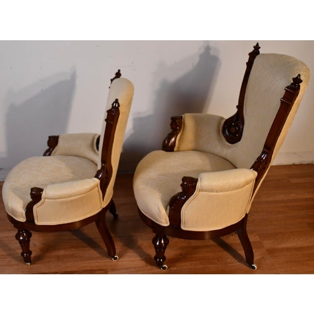 Victorian Walnut Armchair Pair with Carved Busts and Casters
